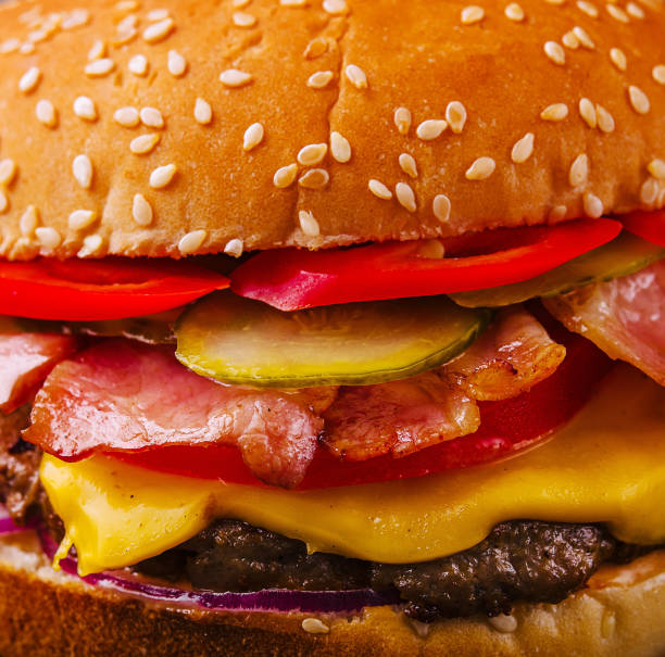 Bacon burger with beef patty close up or macro