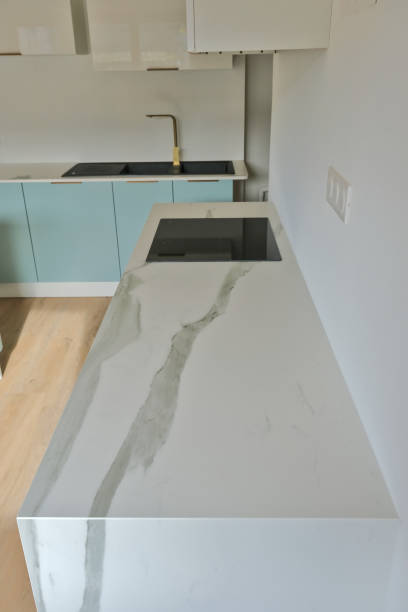 Ceramic worktop: veining and mitering between worktop and vertical wall (jamb) Ceramic worktop: veining and mitering between worktop and vertical wall (jamb) miter saw stock pictures, royalty-free photos & images