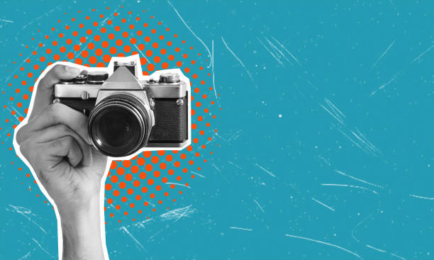 istock Digital collage with hands holding a vintage film camera with space for text. 2042403730