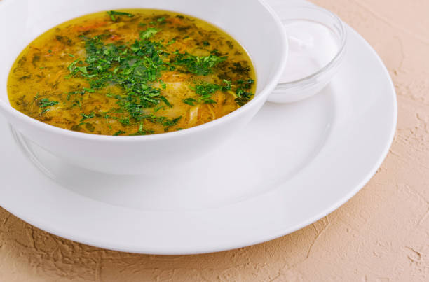 istock parsley noodle soup on white bowl 2042409041