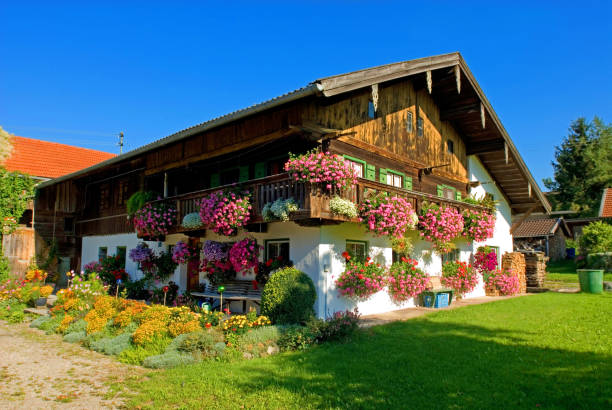 Bad Tölz, Bavaria, Germany, June 2008, old traditional house with many flower boxes