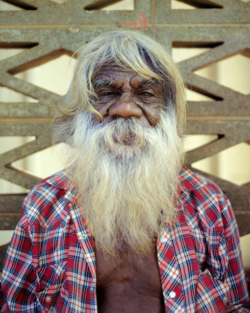 Kochi (Kerala), India: A senior shopkeeper in downtown Kochi looks into the camera.