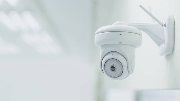 istock Cctv Security Camera Installed in white room or laboratory. Can be used in technology background or security work. 2042500304