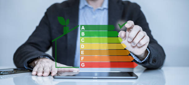 istock Energy efficiency application on tablet. Ecology and energy saving house concept. Home power rating 2042531758