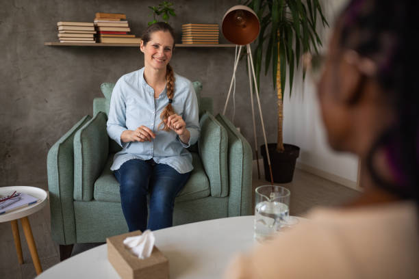 istock Young woman at a therapy session 2042536067