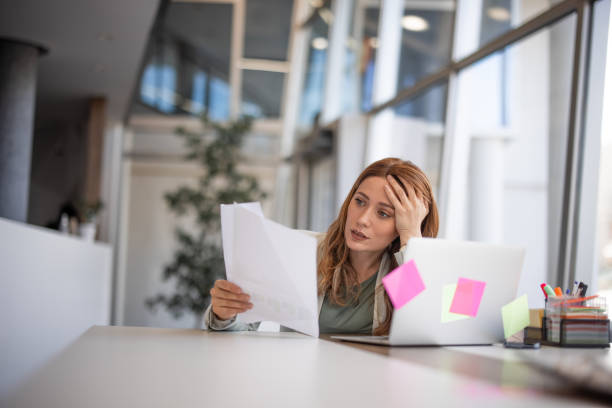 istock Female employee having health problems at workplace 2042557542