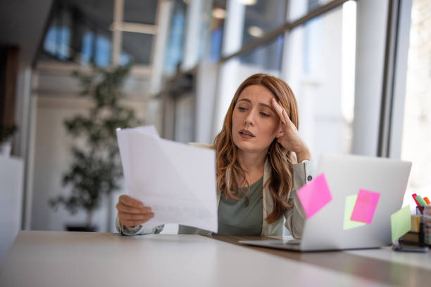 istock Female employee having health problems at workplace 2042557551