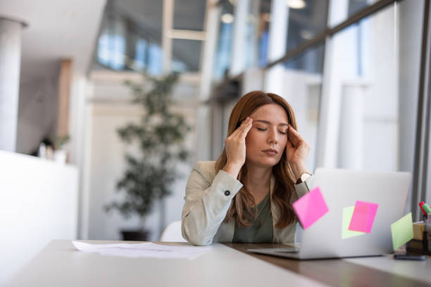 istock Female employee having health problems at workplace 2042558069