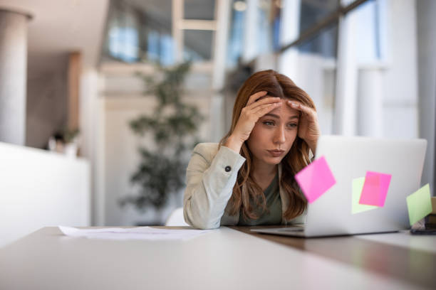 Female employee having health problems at workplace