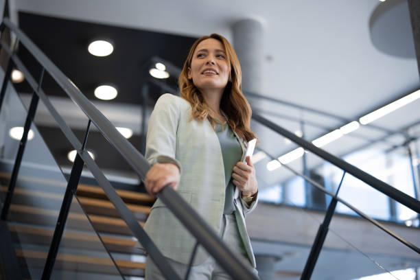 istock Businesswoman Using Digital Tablet in Office 2042579577
