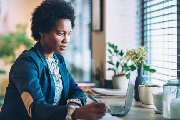 istock Middle aged businesswoman concentrated in her work 2042631749