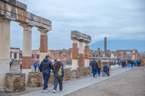 Pompeii, Italy–Dec 28, 2023: tourists at the ancient Pompeii ruins