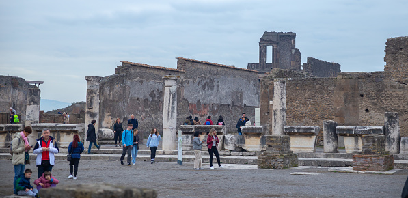 Pompeii, Italy–Dec 28, 2023: tourists at the ancient Pompeii ruins