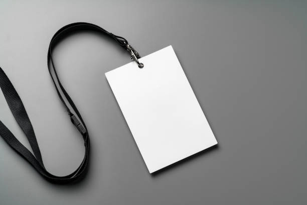 Blank nametag on gray background copy space