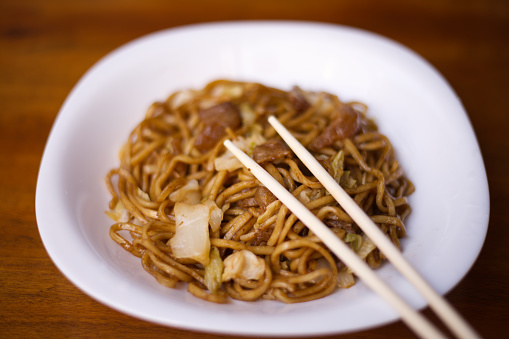 Yakisoba and disposable chopsticks.