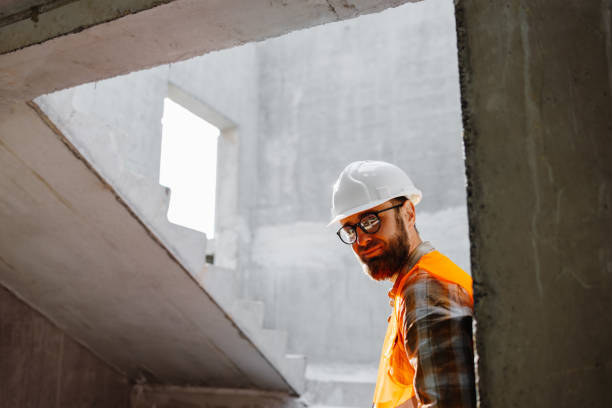 istock Young businessman construction standing on his workplace on the construction site 2042693200
