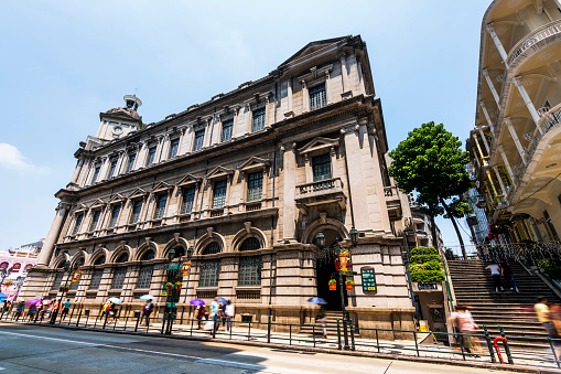 Macau- September 19, 2019: Night view of the General Post Office Building in Macau. The Historic Centre of Macao was inscribed on the UNESCO World Heritage List in 2005.