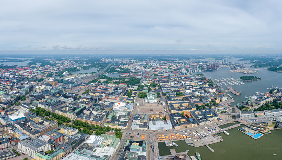 Helsinki Downtown Cityscape, Finland. Cathedral Square, Market Square, Sky Wheel, Port, Harbor in Background.