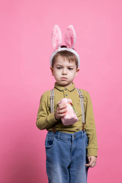 istock Sweet small boy feeling irritated and upset in front of camera 2042721051