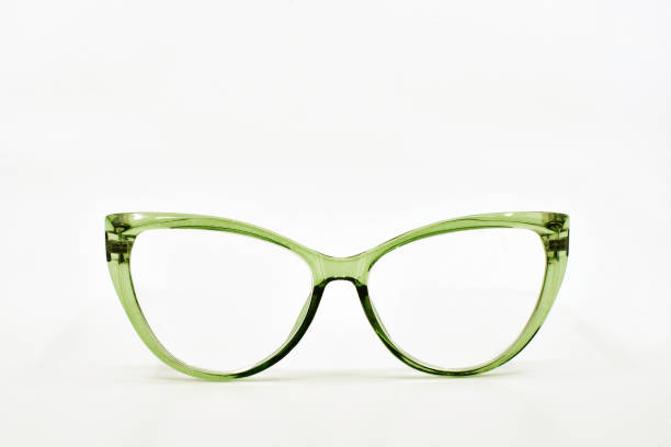 istock Pair of cat eye shape glasses with green frames 2042731826