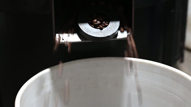 Big roasting machine of coffee beans.
