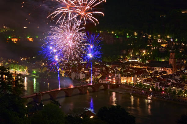 Heidelberg, Germany - May 20, 2013: Firework display at Karl Theodor Bridge. The Heidelberg Castle Lighting and Fireworks is annual event to commemorate the burning of the Heidelberg Castle by the French troops in 1693.