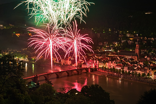 Heidelberg, Germany - May 20, 2013: Firework display at Karl Theodor Bridge. The Heidelberg Castle Lighting and Fireworks is annual event to commemorate the burning of the Heidelberg Castle by the French troops in 1693.