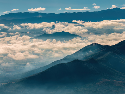 An aerial view of clouds over mountains. Tecalitlan valley in Jalisco, Mexico