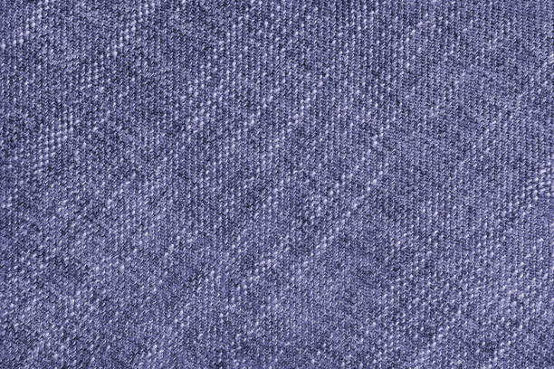 Coarse weave jacquard fabric texture background, purple cloth texture. Textile background, furniture textile material, wallpaper, backdrop. Textile structure close up.