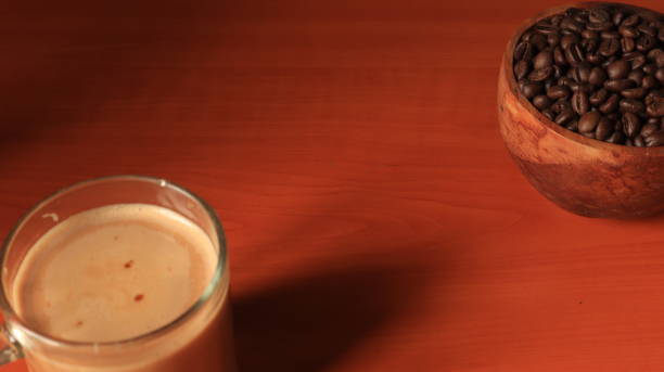 Indonesian coffee on wooden background. Coffee Beans in wooden container.