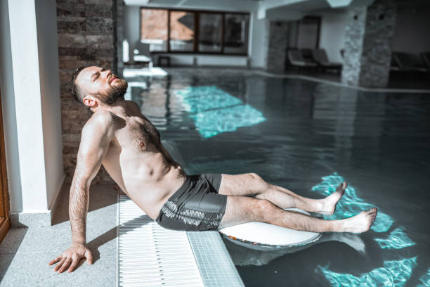 istock Tranquility And Relaxation For Handsome Male In Swimming Pool 2042833896