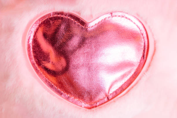 Red heart symbol with white outline in black