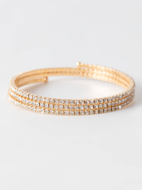 istock Gold bracelet isolated white background 2042904879