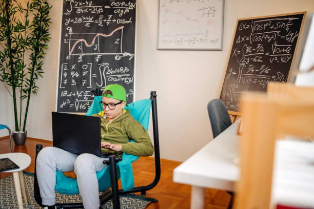 Boy working on school project at home