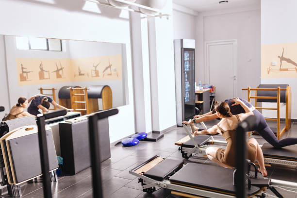 istock Woman stretching on a pilates bed 2042927832