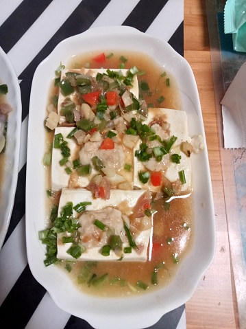 Steamed tofu with delicious ground chicken and added soy sauce