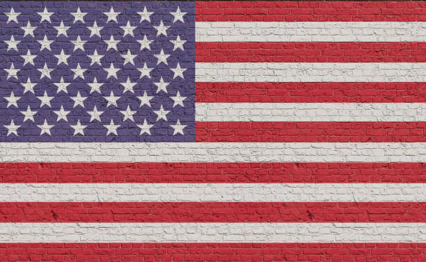 istock United States flag colors painted on a brickwall. 2042978871