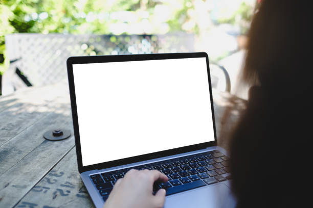 istock mockup image computer blank screen for hand typing text,using laptop contact business searching information in workplace on desk at office. 2042982769
