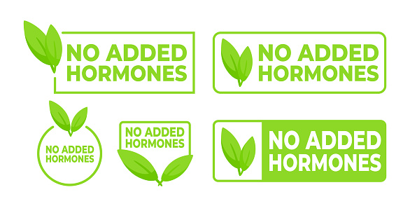 Set of labels in green with a leaf symbol declaring No Added Hormones, ideal for clean and trustworthy food product packaging