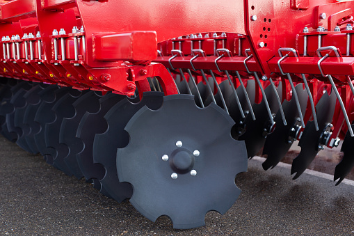 Trailed in-line disc harrow at an agricultural exhibition