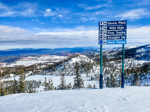 On mountain trail signs, Brian Head ski resort, Utah.