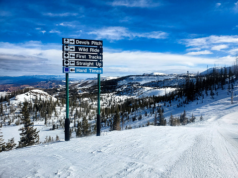 On mountain trail signs, Brian Head ski resort, Utah.
