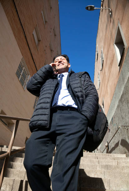istock Businessman on the way to work, going down stairs 2043048462
