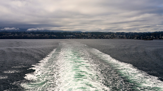 View  of Nanaimo from the stern of a British Columbia Ferry that has just left the Departure Bay Ferry Terminal.