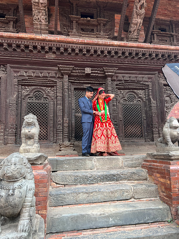 bride and groom are on temple for wedding ceremony in Katmandu, Nepal, June 2023