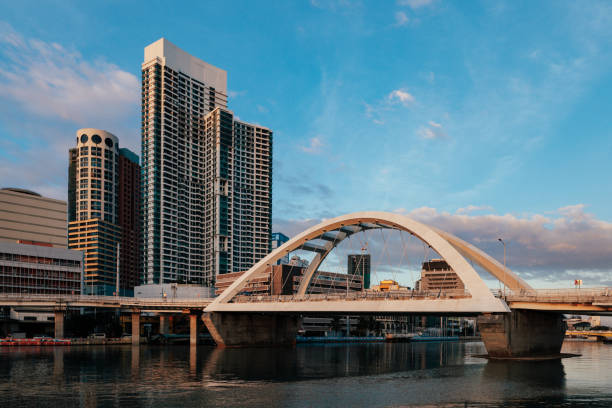 istock Manila City skyline during sunset with a bridge connecting Intramuros to Binondo area 2043090584