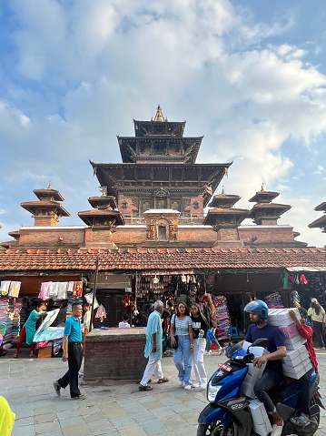 people are walking and shopping in katmandu street vertical editorial still Katmandu, Nepal, June 2023