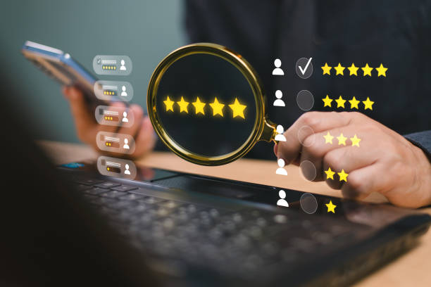 istock Customer review satisfaction feedback survey concept. User give five happy smile face rate to business service excellent experience on magnify glass. Client evaluate five star of service reputation 2043110803