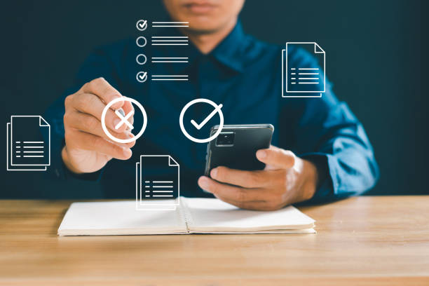 istock Businessmen use computers for online auditing investigations and manage electronic documents on digital documents. 2043132155
