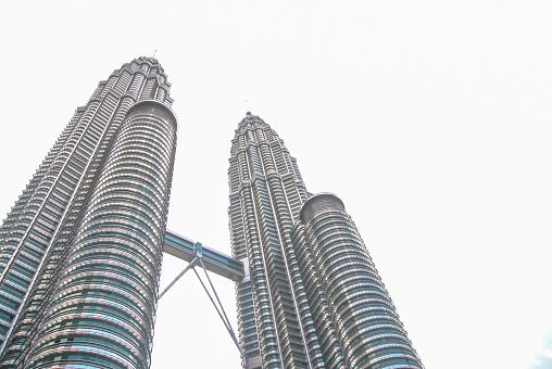 Focus on Petronas Twin Towers (Kuala Lumpur City Centre Twin Towers) in Malaysia